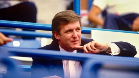 Getty Images Mr Trump, a New York native, watches the US Open in 1987