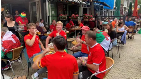 BBC Wales fans gathered in Nieuwmarkt, Amsterdam