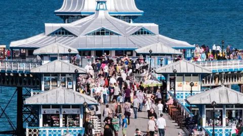 Getty Images Crowds on Llandudno Pier