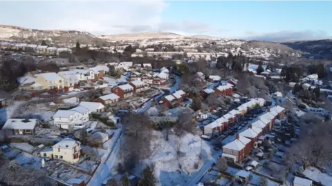 Brandon Beddis Snowy aerial view of homes in Torfaen county