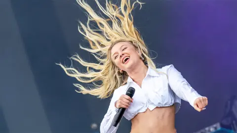 Getty Images Zara Larsson performing on stage at Big Weekend