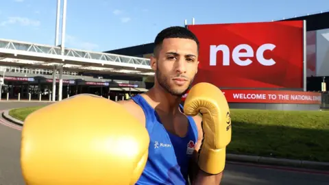 Getty Images Team England athlete Galal Yafai poses for a photo at the NEC