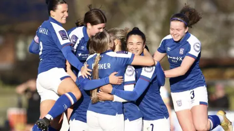 Ross Halls Ipswich Town women celebrate a goal scored