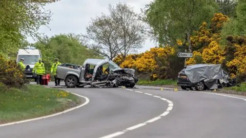 Woman dead and man hurt in road crash near Forres