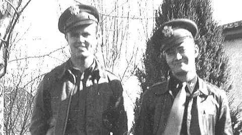 CAAC 1st Lt Sidney W Dunagan (l) and another soldier