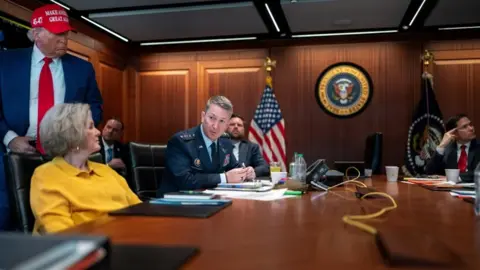U.S. President Donald Trump holds a meeting with White House Chief of Staff Susie Wiles, Chairman of the Joint Chiefs of Staff General Dan Caine and other cabinet members in the Situation Room at the White House on 21 June 2025
