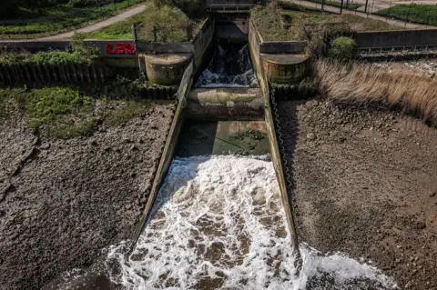 Dan Kitwood/Getty Images Discharge is seen flowing into the River Thames at Crossness sewage treatment works