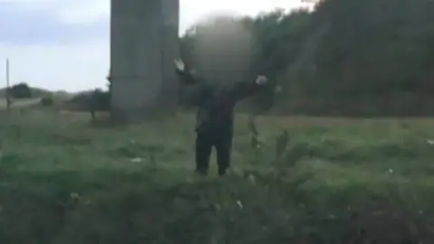 Ogmore Angling Association Alleged poacher gesturing at the camera