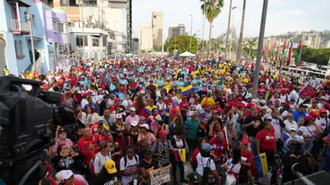 Maduro supporters were bused to Caracas this week for his final rally