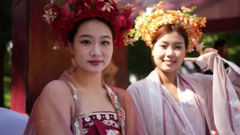 Lily and Anna dressed in traditional costume