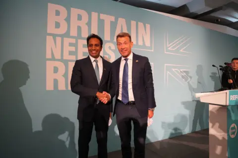 PA Wire Former chairman Zia Yusuf with Reform UK's new chairman David Bull during a press conference at Church House in Westminster
