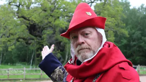 Richard Townsley Man in front of tree