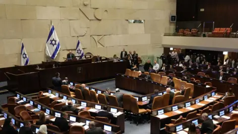 EPA A file photograph showing the chamber of the Israeli parliament, the Knesset