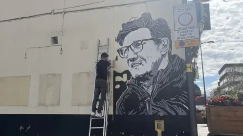 Jayson Swift Working on a Luton Town Football Club Mural