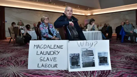 Getty Images Survivors of mother-and-baby homes and Magdalene laundries gathered at the Stormont Hotel 