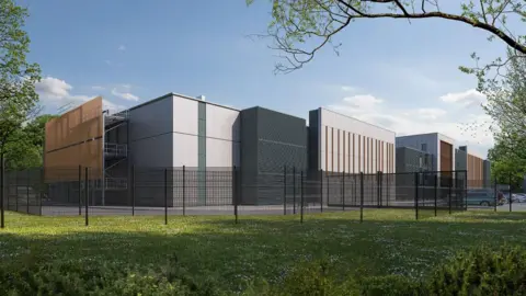 A CGI rendering of how the data centre is expected to look, with a number of grey frontages situated next to each other and a fence in the foreground.