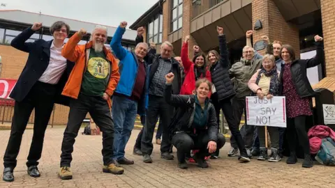 Campaigners celebrating after the decision was made