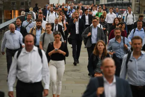 Bloomberg People commuting to work 