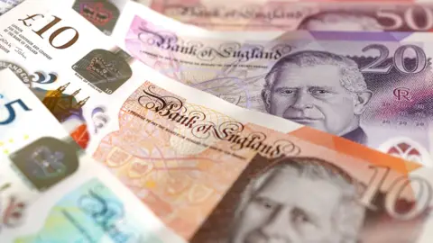 British bank notes showing King Charles. £5, £10, £20, £50 featured.
