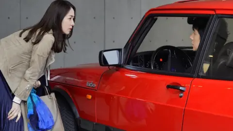 Getty Images Oto (Reika Kirishima) and Yusuke Kafuku (Hidetoshi Nishijima)