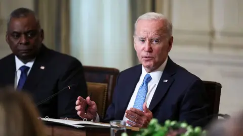 Kevin Dietsch/Getty Images Joe Biden and Lloyd Austin at a White House meeting in 2022.