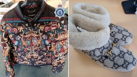 Cheshire Police A multi-coloured and flamboyantly patterned designer jacket, with scrolls and flowers in the design, and a pair of white fur-lined wool grey and blue patterned shoes
