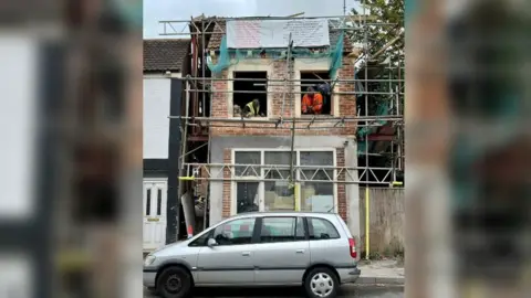 A building with scaffolding work