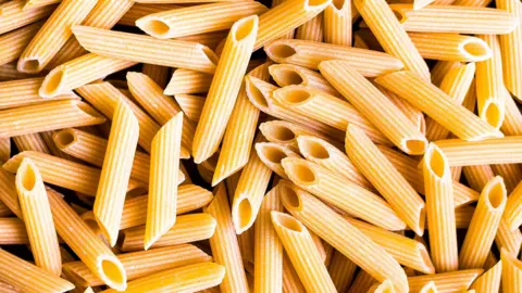 File image of dried penne pasta