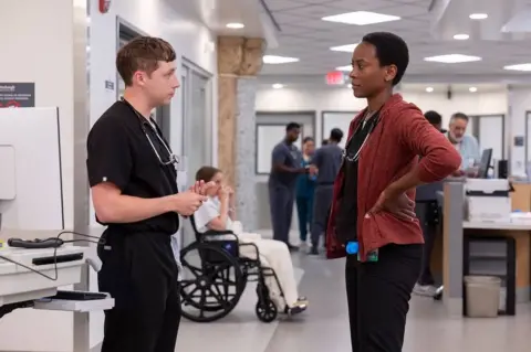 HBO Max Dr Whitaker (Gerran Howell) and Tracy Ifeachor (Dr Heather Collins)