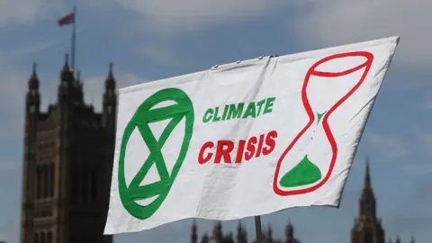 PA Media Protest sign at march