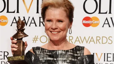 Getty Images Imelda Staunton with the Olivier Award she won for Gypsy in 2016