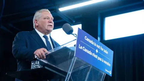 Getty Images Ontario Premier Doug Ford gives remarks at a press conference in Queen's Park on March 10, 2025 in Toronto, Canada. 