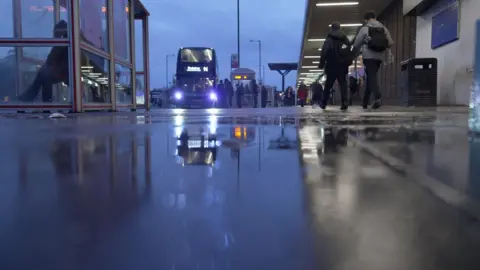 BBC/Andy Alcroft Chelmsley Wood bus station, on a dark, wet evening. 