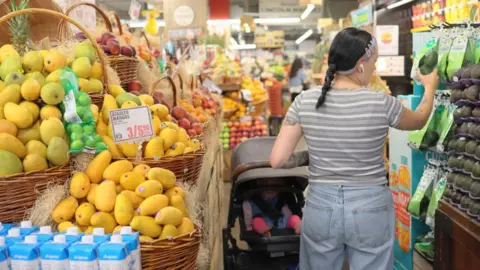 Getty Images  People shop at Lincoln Market on June 12, 2023 in the Prospect Lefferts Gardens neighborhood in the Brooklyn borough of New York City. 