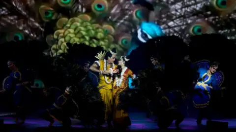 Getty Images Artists perform in the roles of Sita (R), the wife of Hindu god Rama (L), in the 'Ramlila,' a 10-day enactment of the life of Hindu deity Rama which culminates in the festival of Dussehra, organised by Shriram Bharatiya Kala Kendra.