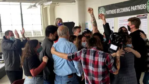 Getty Images Starbucks staff celebrate the vote for the chains first US union