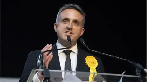 PA Media Alex Cole Hamilton