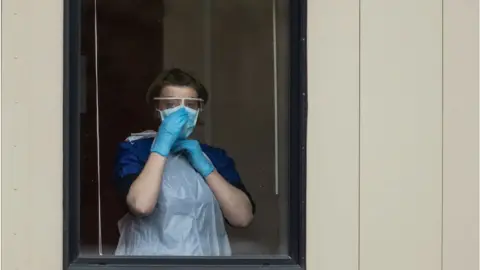 Getty Images Nurse with facemask