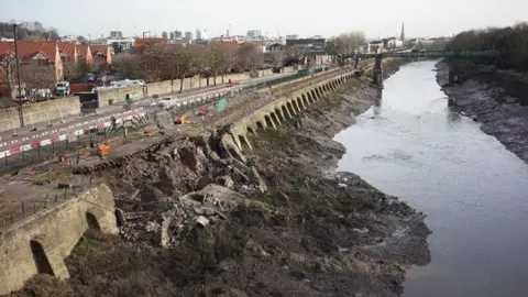 Bristol City Council Cumberland Road embankment repairs with Bristol city centre in the background
