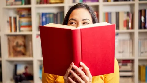 Woman reading book