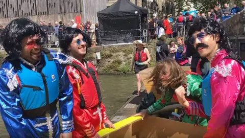 Team getting ready for the cardboard boat race