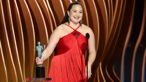 Getty Images Lily Gladstone accepts the Outstanding Performance by a Female Actor in a Leading Role award for "Killers of the Flower Moon" onstage during the 30th Annual Screen Actors Guild Awards at Shrine Auditorium and Expo Hall on February 24, 2024 in Los Angeles, California.