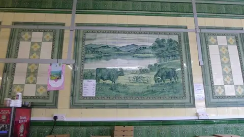 Historic England Country scene on wall tiles