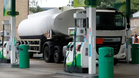 Reuters A fuel tanker parked at a BP filling station in Hersham