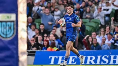 Jimmy O'Brien celebrates scoring a try