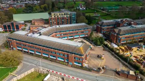 A bird's eye view of St Martin's Place in Slough, an office complex of four buildings.