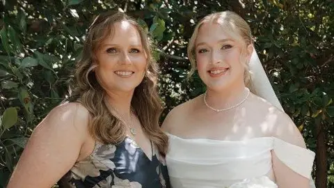 Hannah Leonard-Ripley with her mother at her wedding