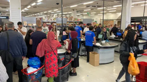 Steve Martin/BBC  Shoppers in Ipswich Bazaar