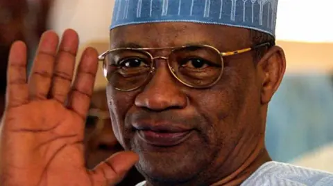 Getty Images Close Plan of Gene Babangida wearing civilian clothes