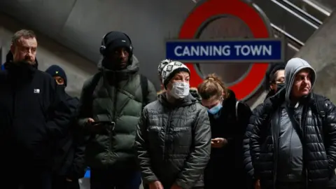 Reuters Commuters at Canning Town